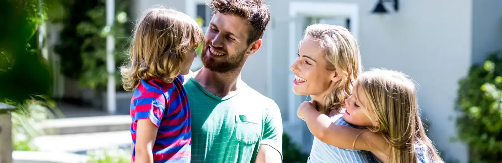 Family outside in mosquito free yard