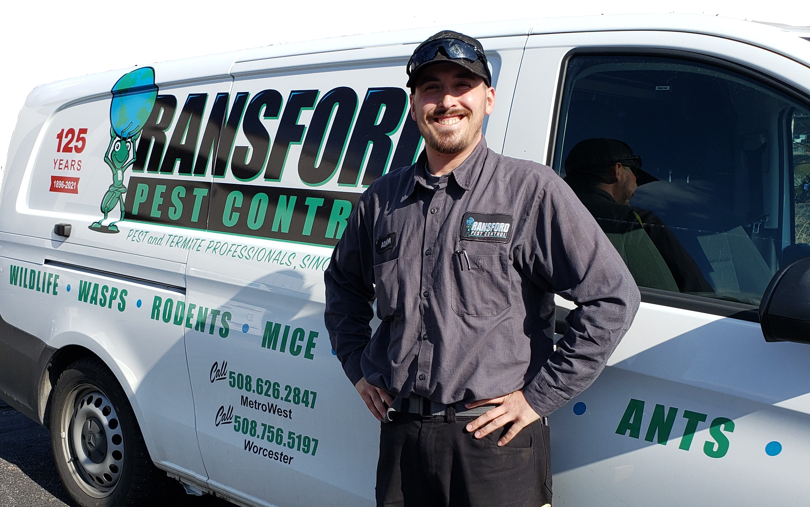 Ransford employee in front of Ransford-branded Van